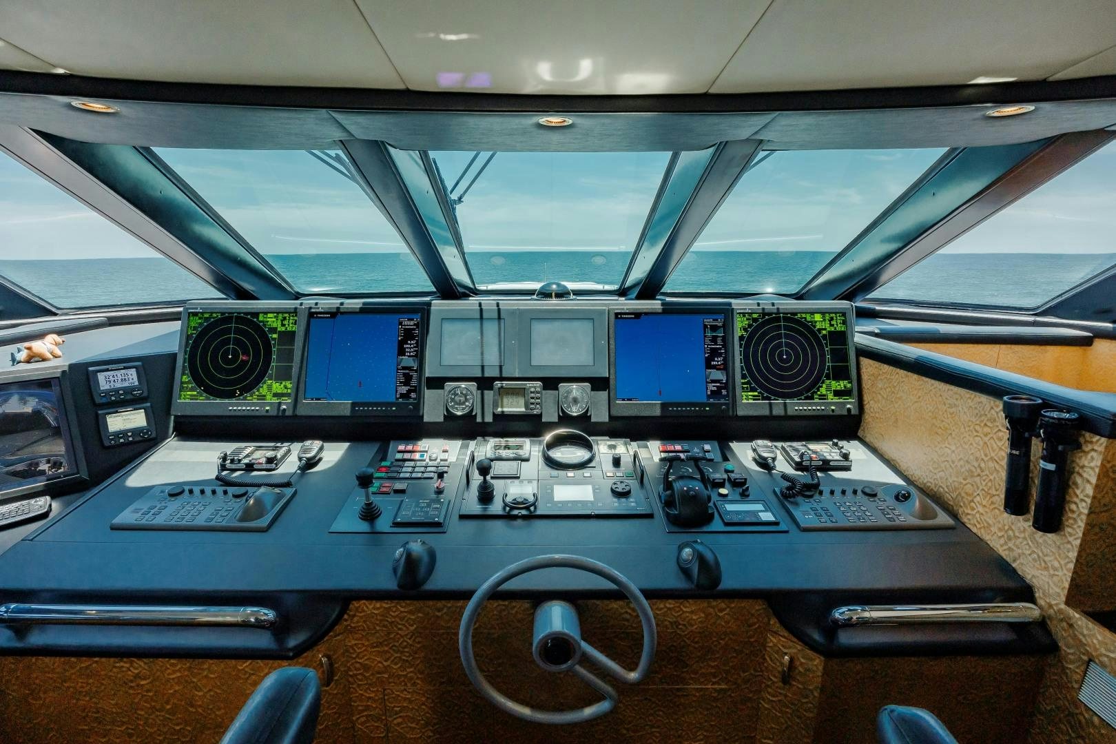 a control panel of a plane aboard CAPRICE Yacht for Sale