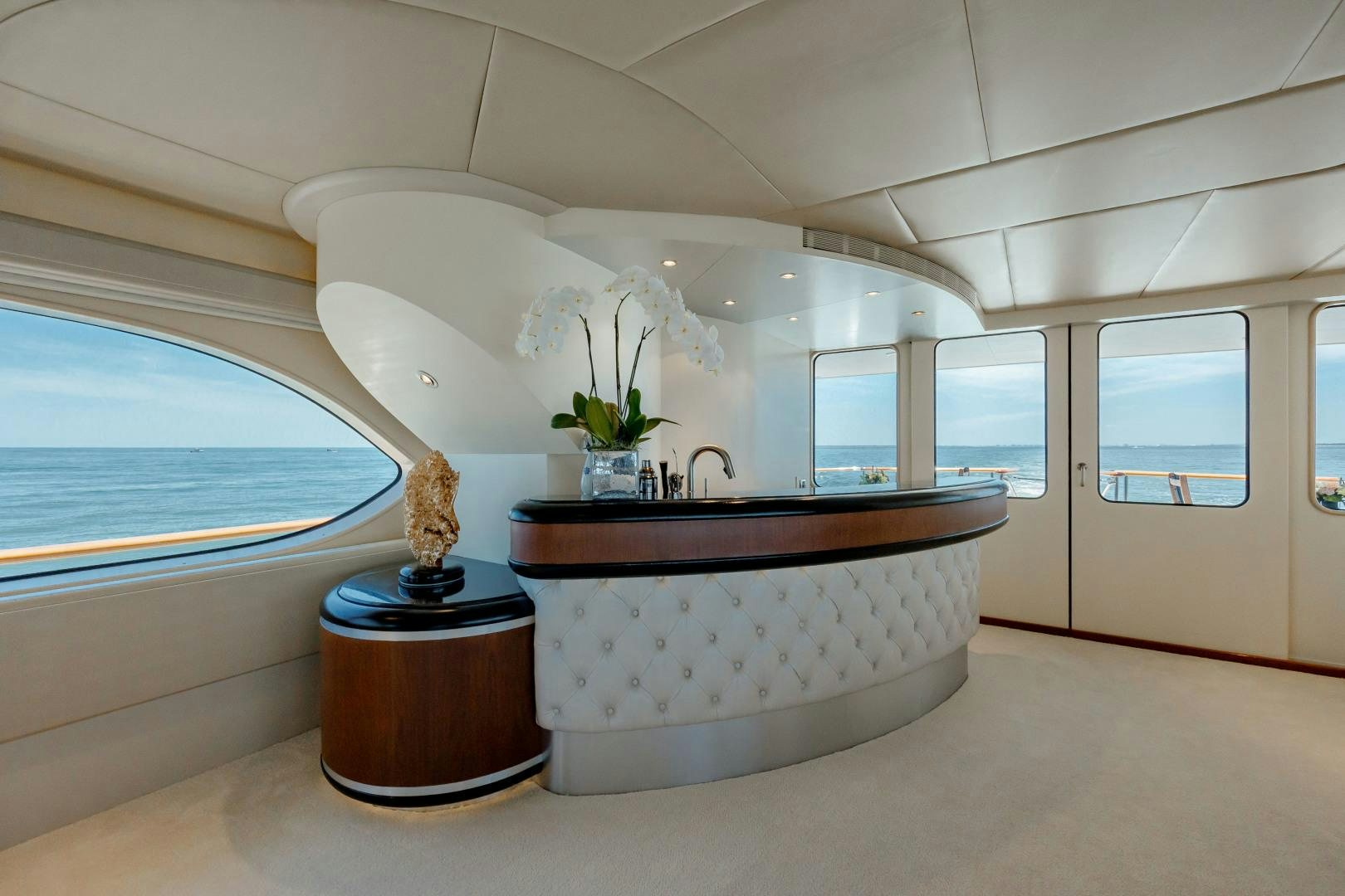 a large white bathtub with a marbled floor aboard CAPRICE Yacht for Sale
