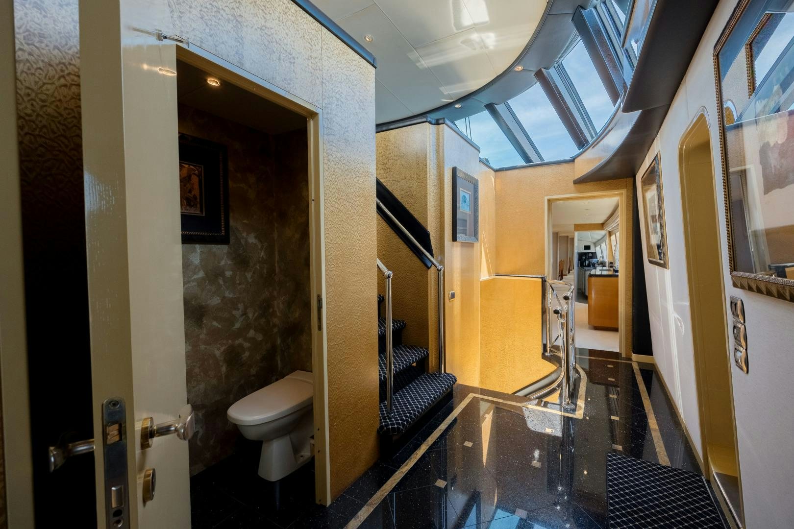 a bathroom with a glass shower aboard CAPRICE Yacht for Sale