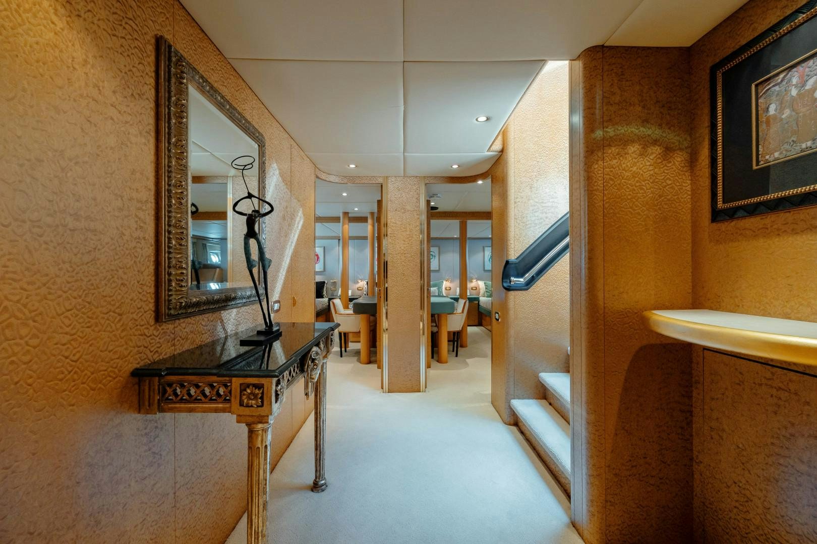 a room with a table and chairs aboard CAPRICE Yacht for Sale