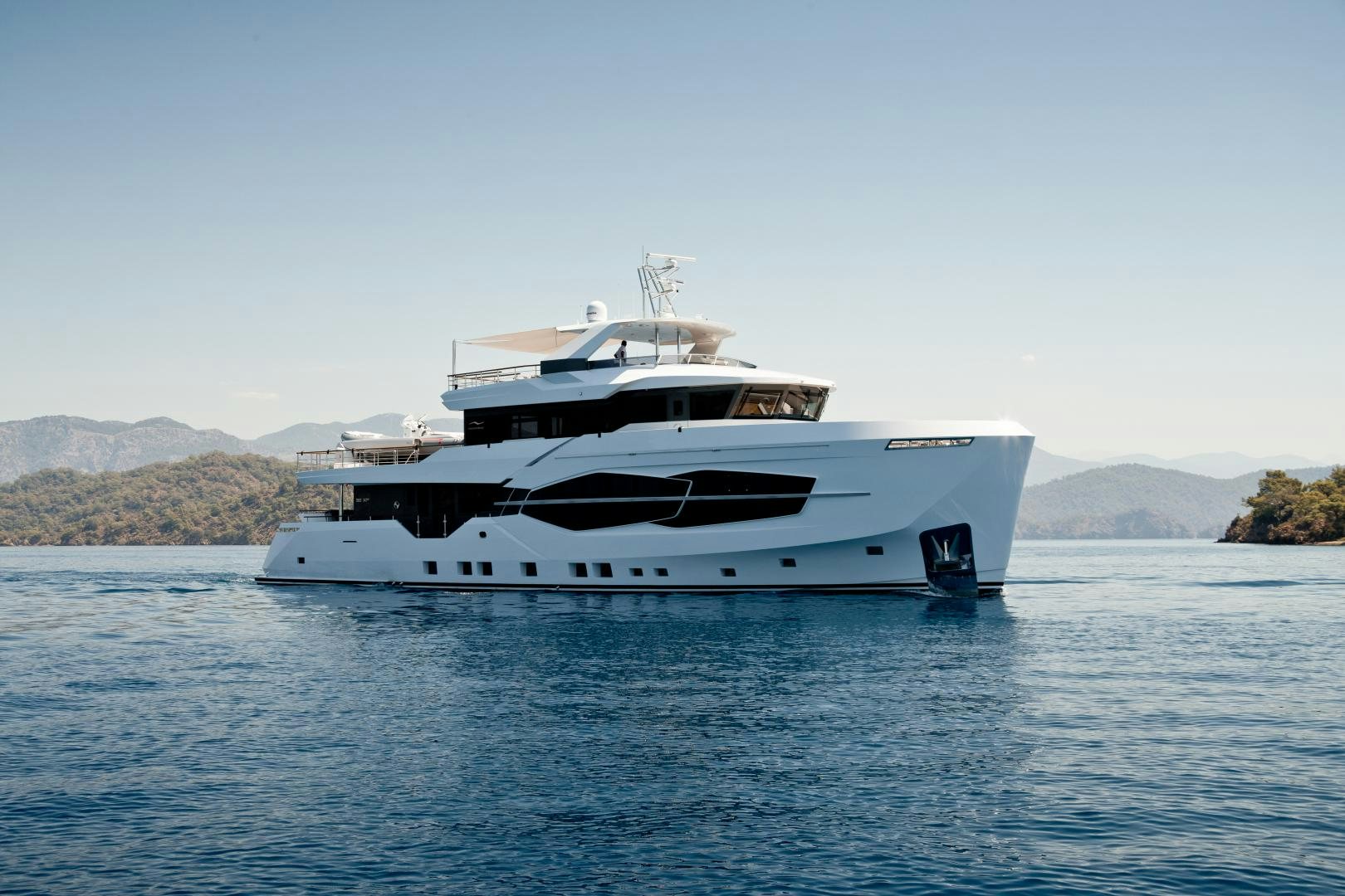 a white yacht on the water aboard NUMARINE 30XP/02 Yacht for Sale