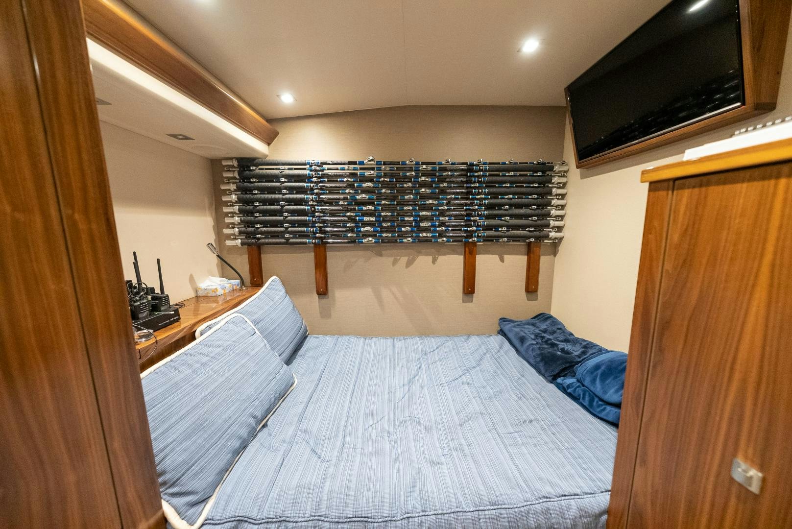 a bed in a room aboard SIR' REEL Yacht for Sale
