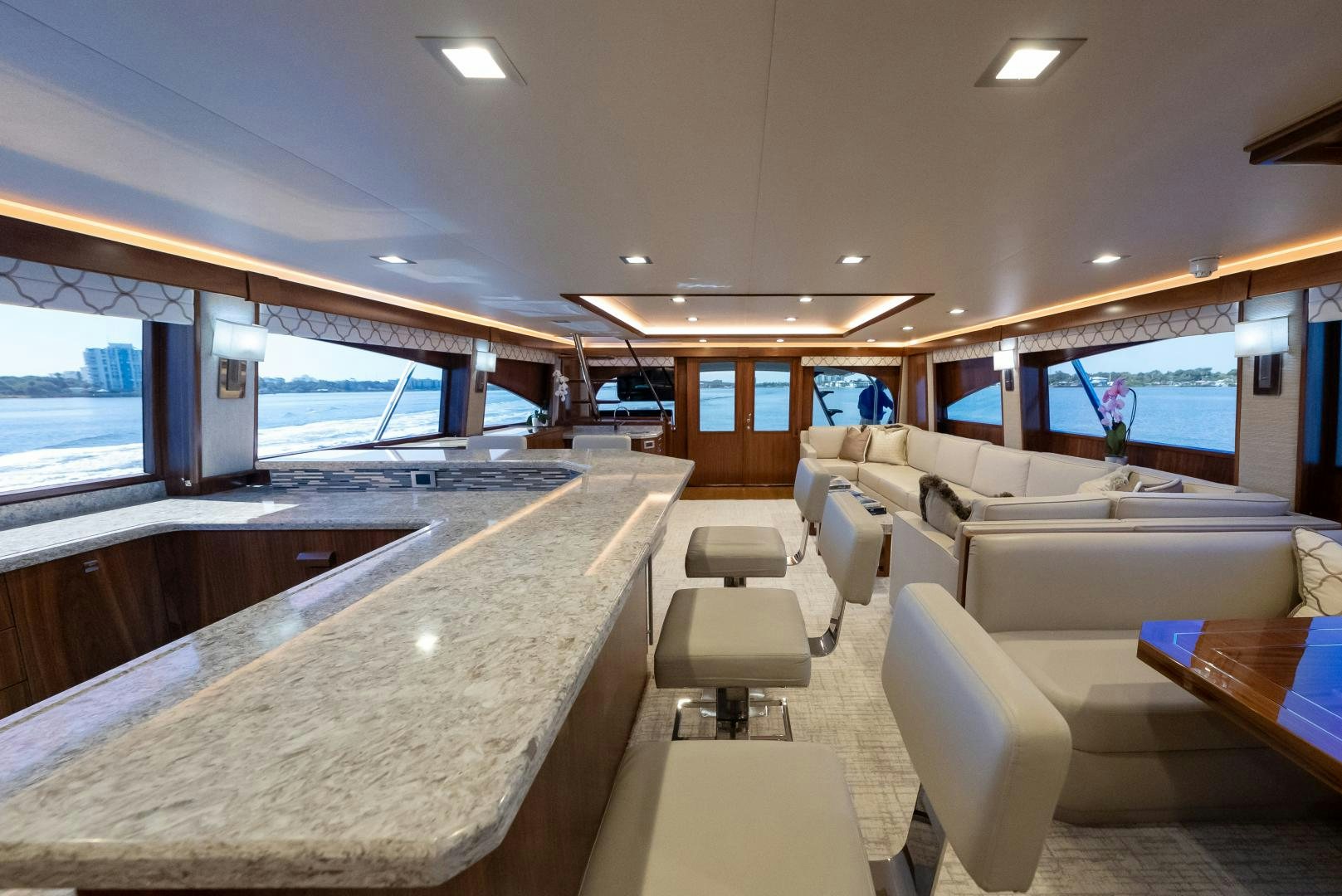 a room with a table and chairs aboard SIR' REEL Yacht for Sale