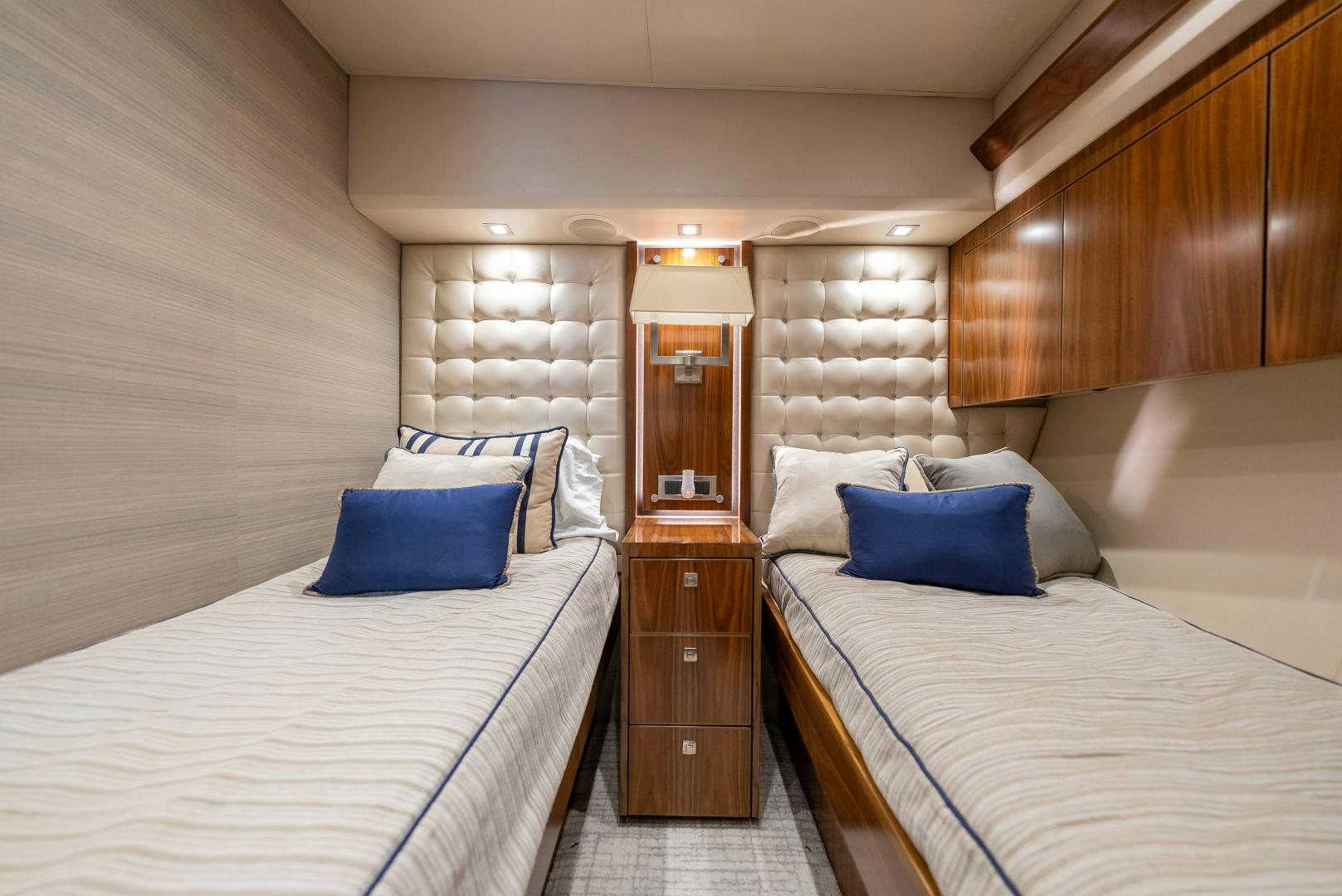 a room with two beds aboard SIR' REEL Yacht for Sale