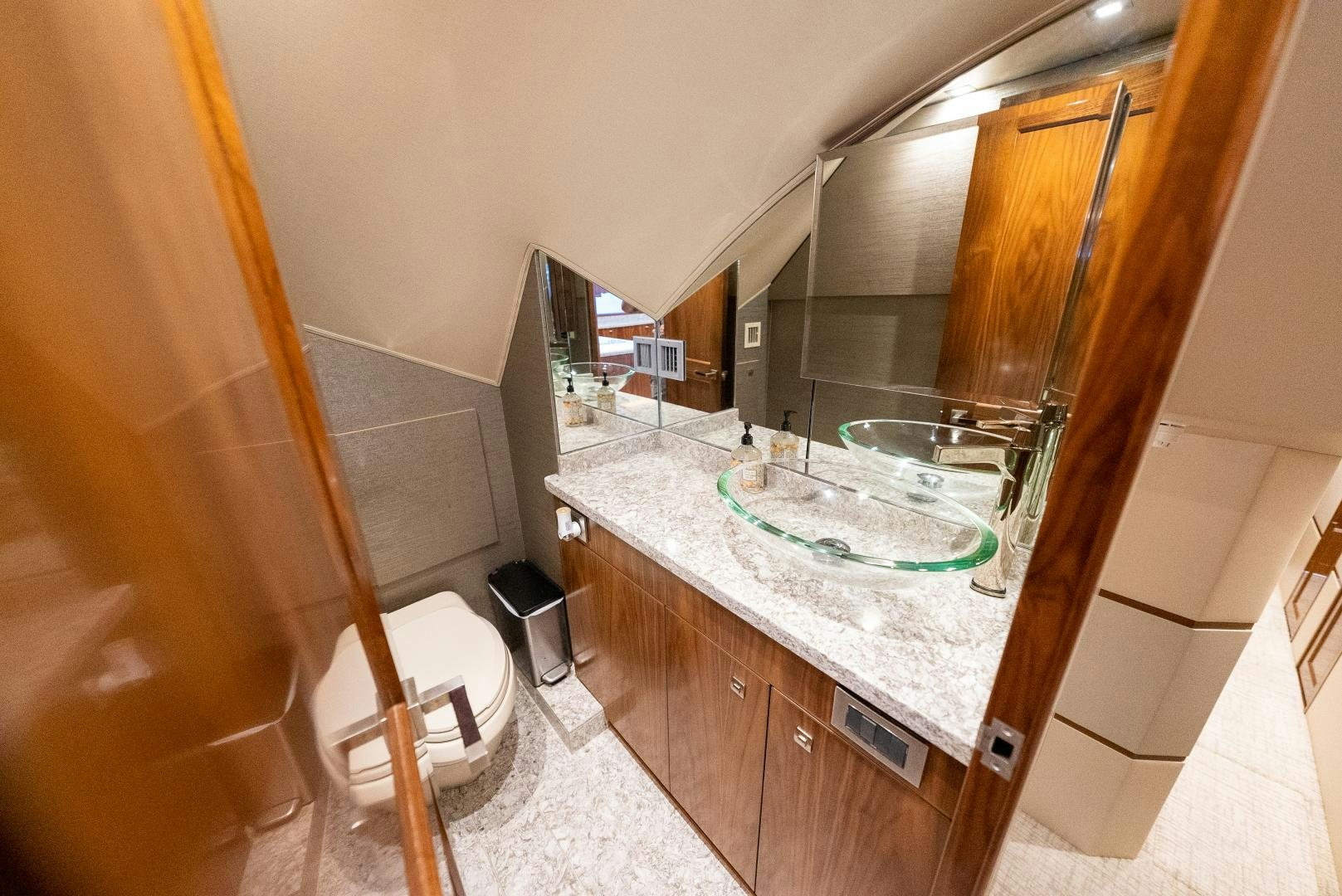 a bathroom with a marble counter aboard SIR' REEL Yacht for Sale