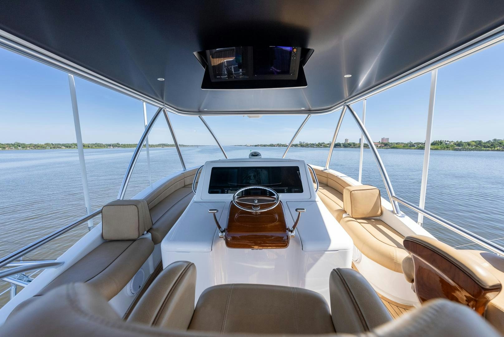 a boat with seats and a steering wheel on a boat aboard SIR' REEL Yacht for Sale