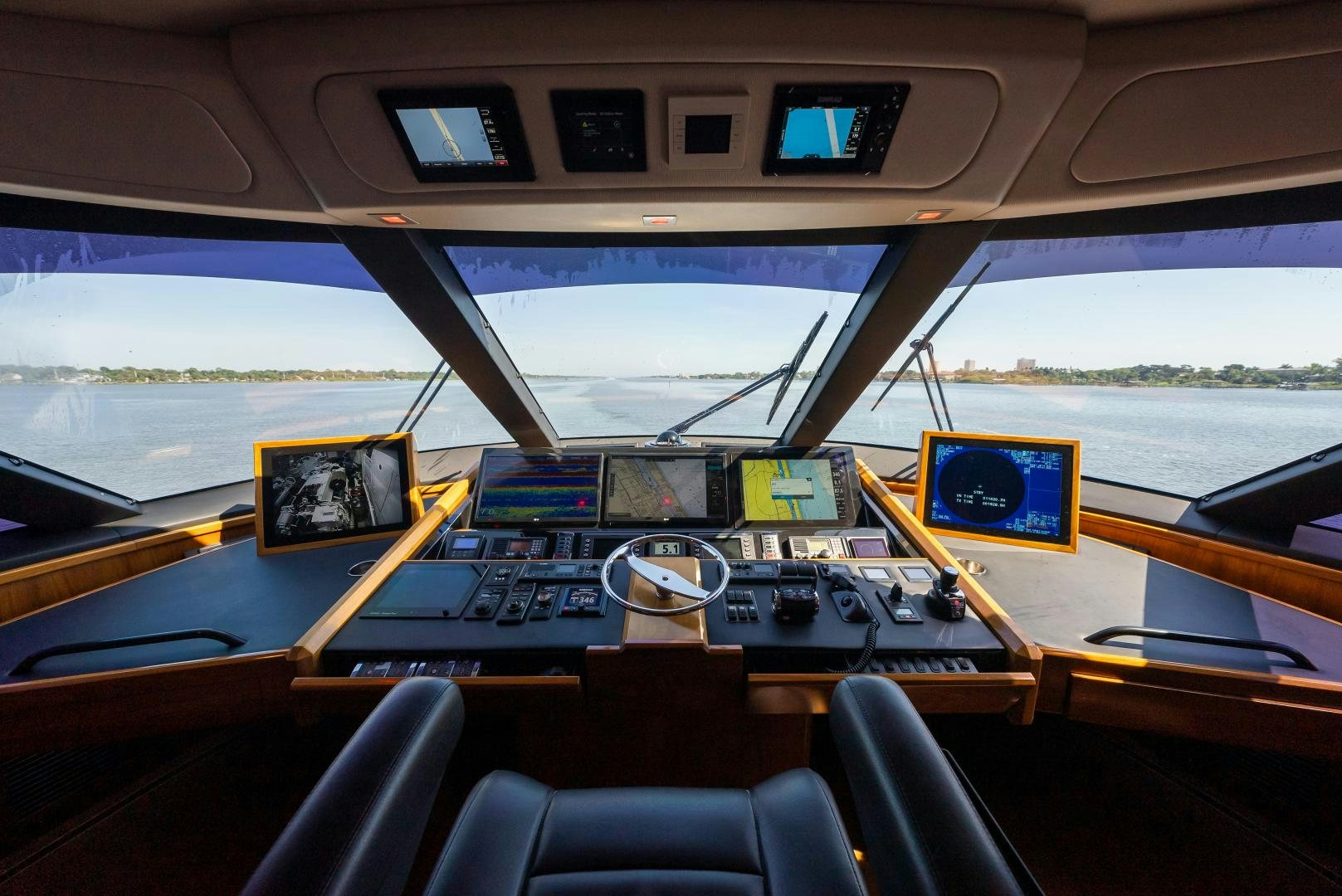 inside of a vehicle with monitors and screens aboard SIR' REEL Yacht for Sale