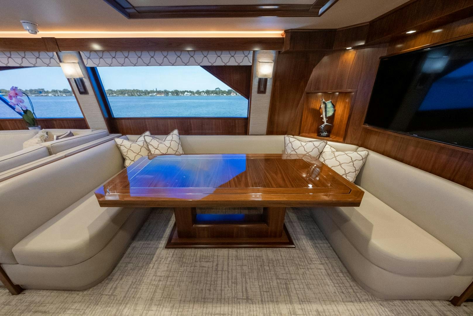 a room with a large bed and a pool aboard SIR' REEL Yacht for Sale
