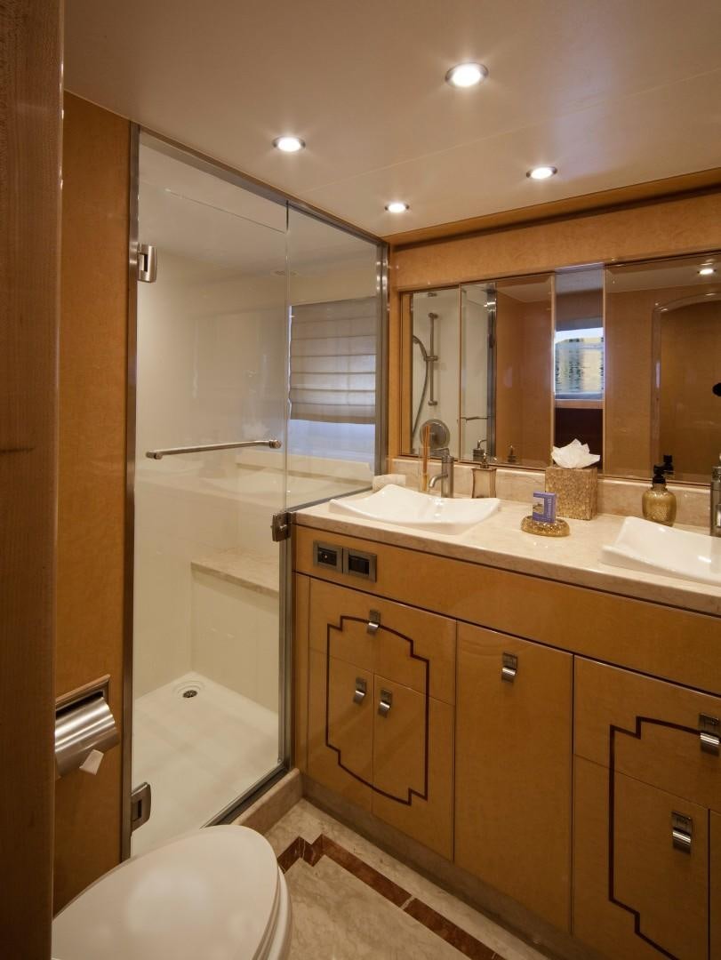 a bathroom with a standup shower aboard ADVENTURE US II Yacht for Sale