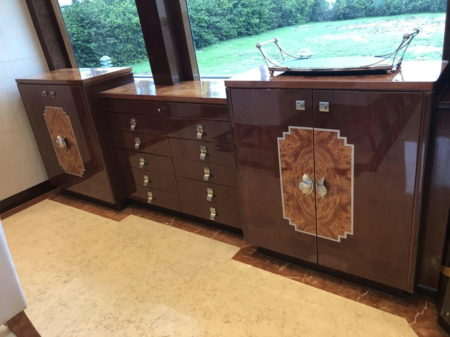 a wooden cabinet with drawers aboard ADVENTURE US II Yacht for Sale