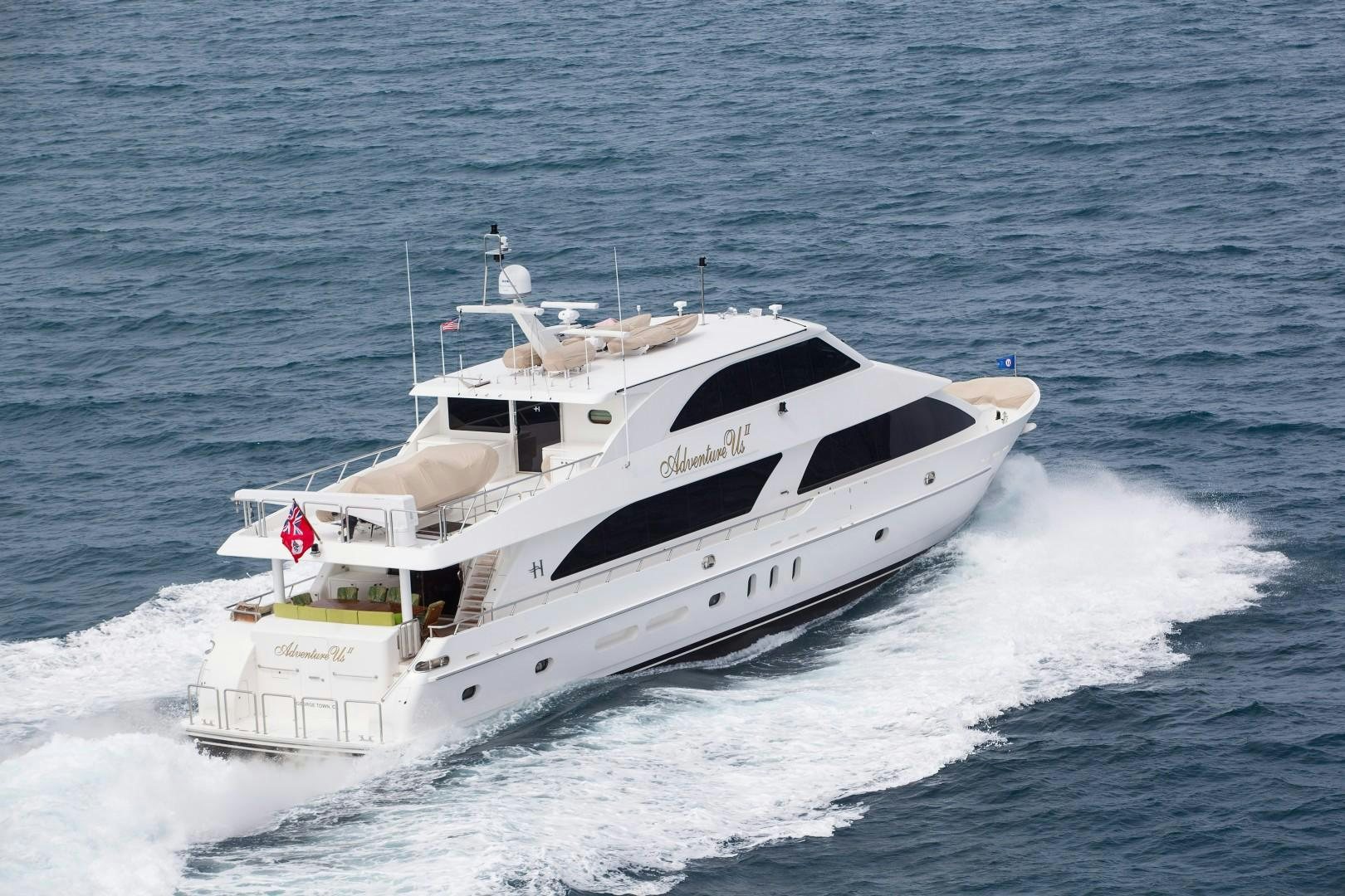 a white yacht on the water aboard ADVENTURE US II Yacht for Sale