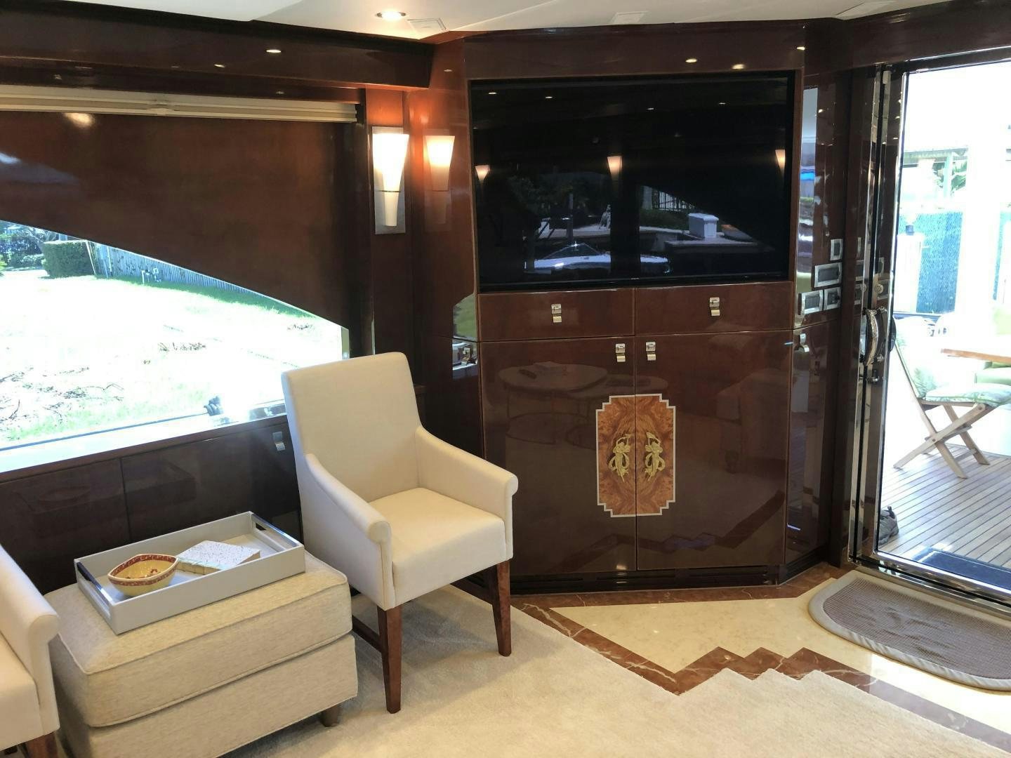a room with a chair and a table aboard ADVENTURE US II Yacht for Sale