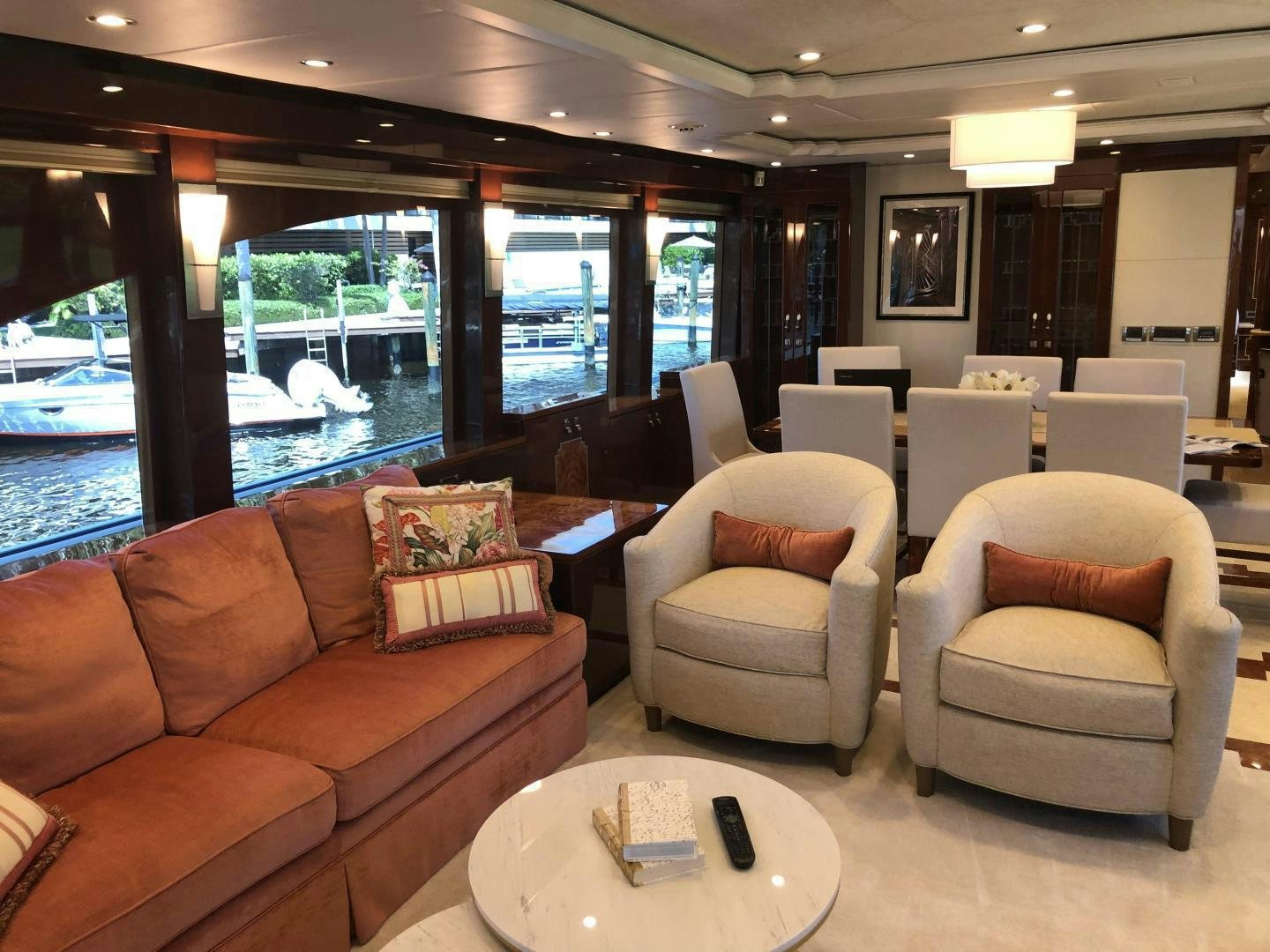a living room with a large window aboard ADVENTURE US II Yacht for Sale