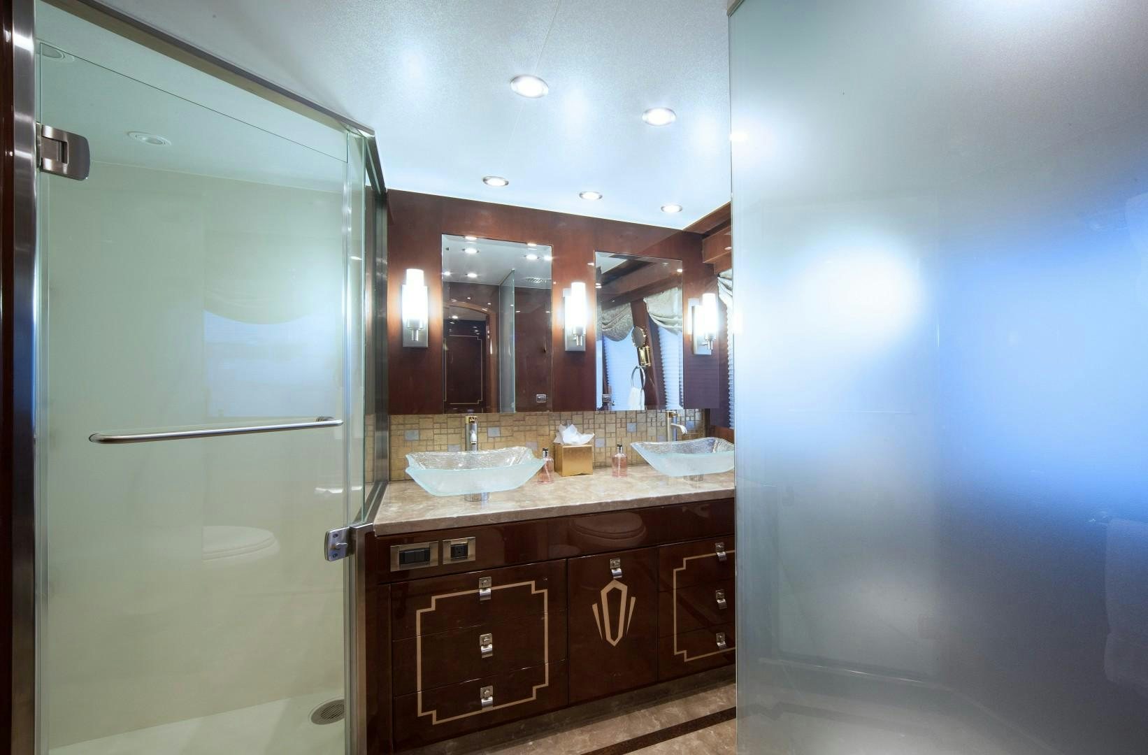 a bathroom with a sink and a shower aboard ADVENTURE US II Yacht for Sale