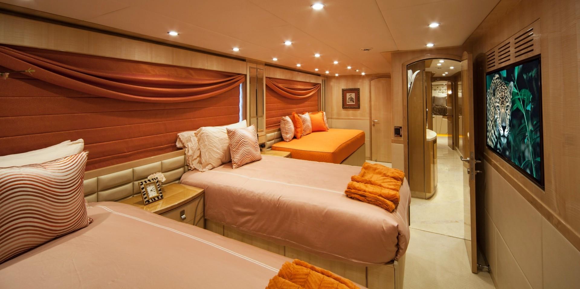 a room with two beds aboard ADVENTURE US II Yacht for Sale