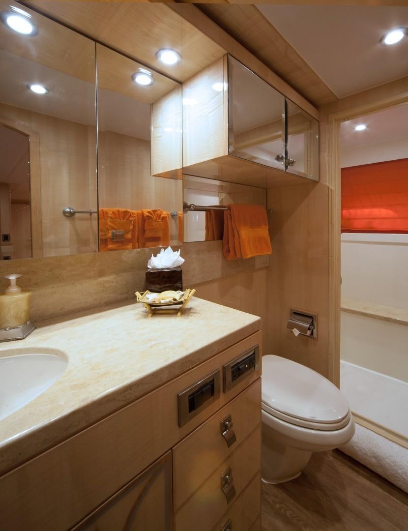 a bathroom with a large mirror aboard ADVENTURE US II Yacht for Sale
