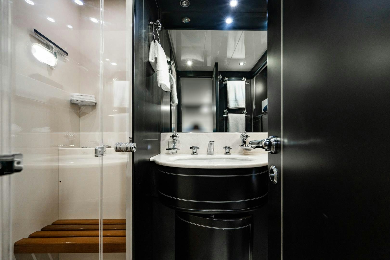 a bathroom with a standup shower aboard IV GIOCARE Yacht for Sale