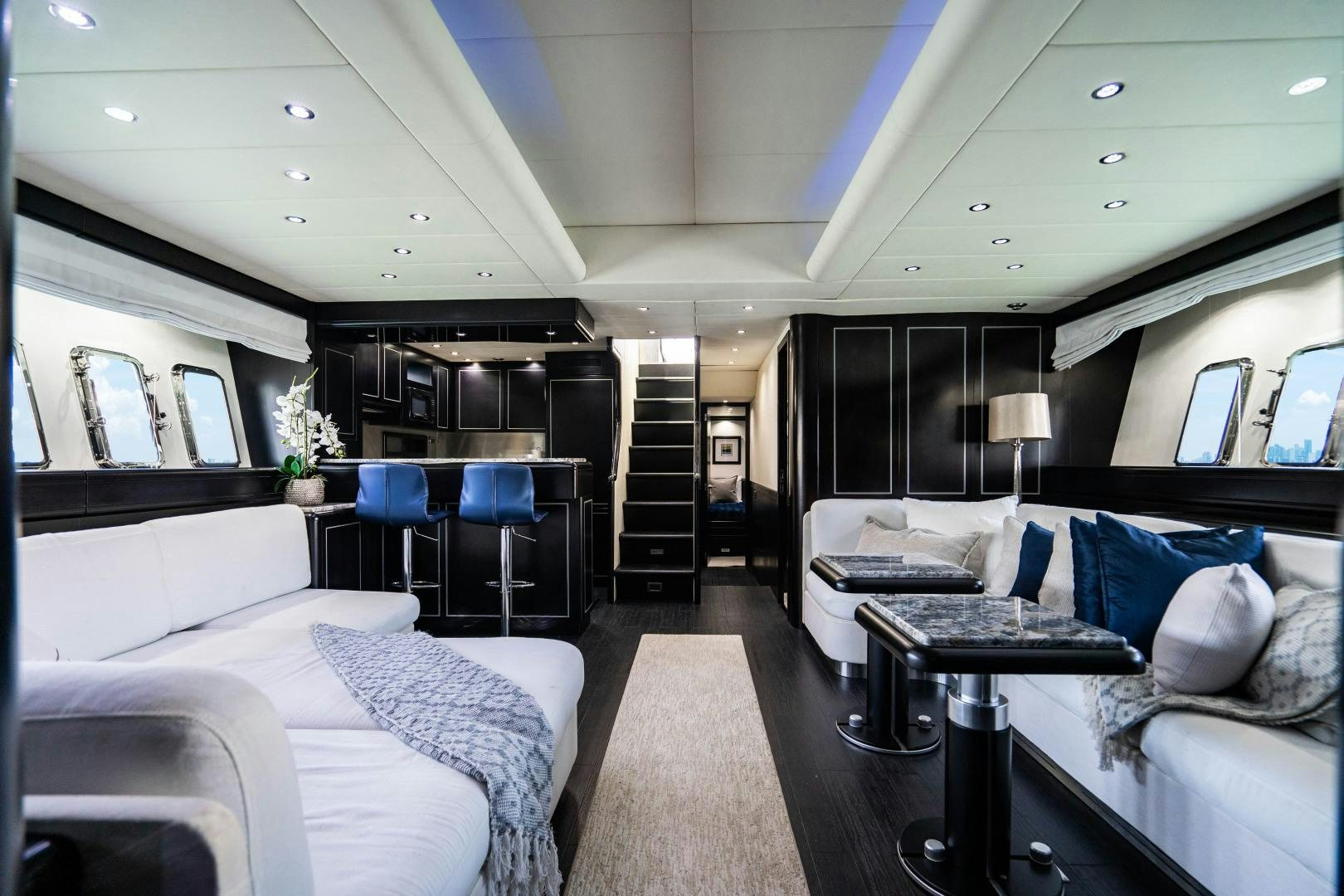 a room with a bed and a desk aboard IV GIOCARE Yacht for Sale