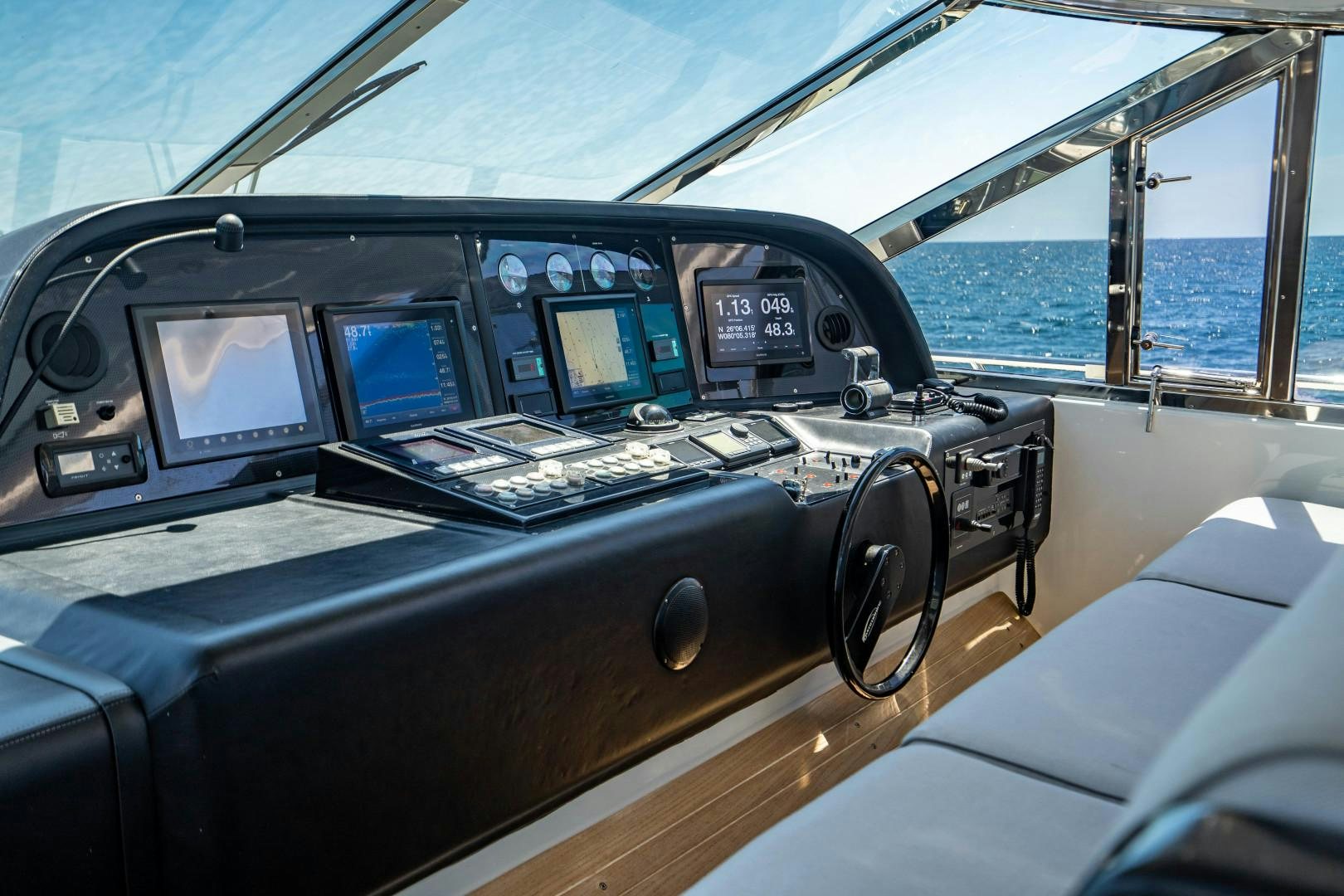 inside of a cockpit aboard IV GIOCARE Yacht for Sale