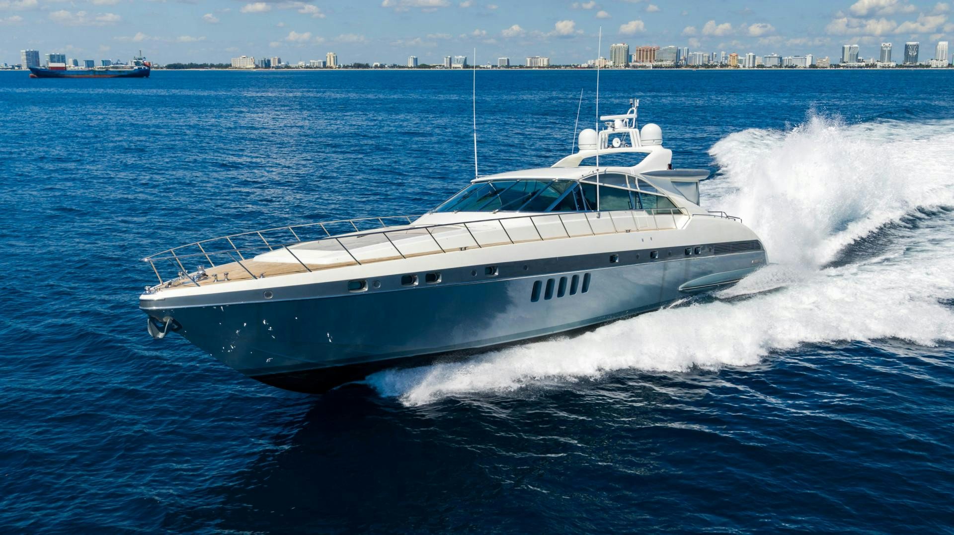 a white yacht on the water aboard IV GIOCARE Yacht for Sale