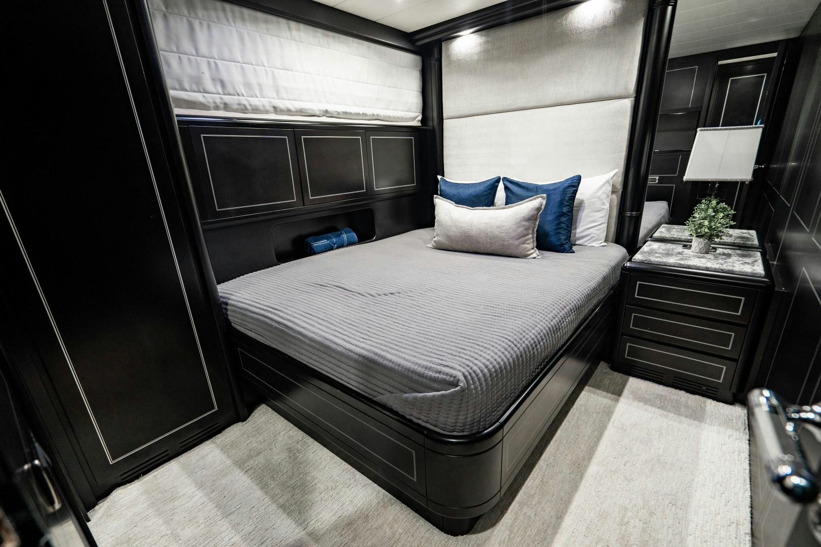 a bed in a room aboard IV GIOCARE Yacht for Sale