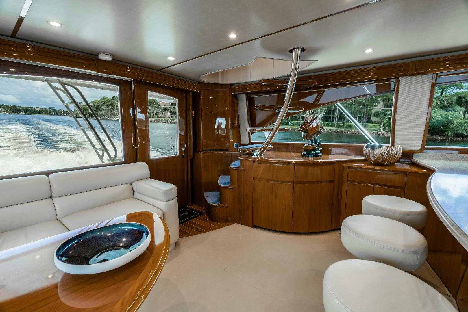 a room with a bed and a table aboard SUNSHINE Yacht for Sale