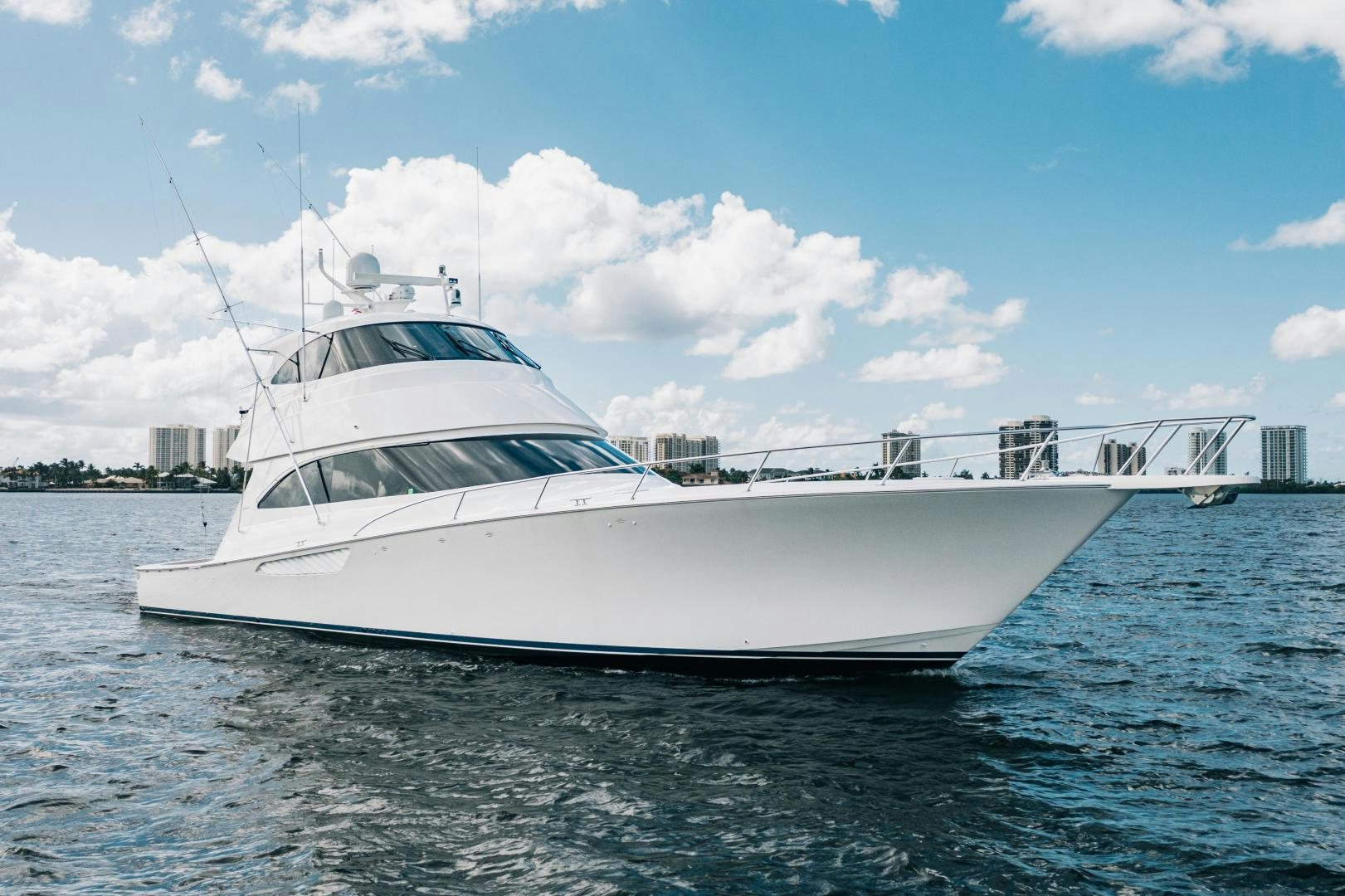 a white yacht on the water aboard SUNSHINE Yacht for Sale