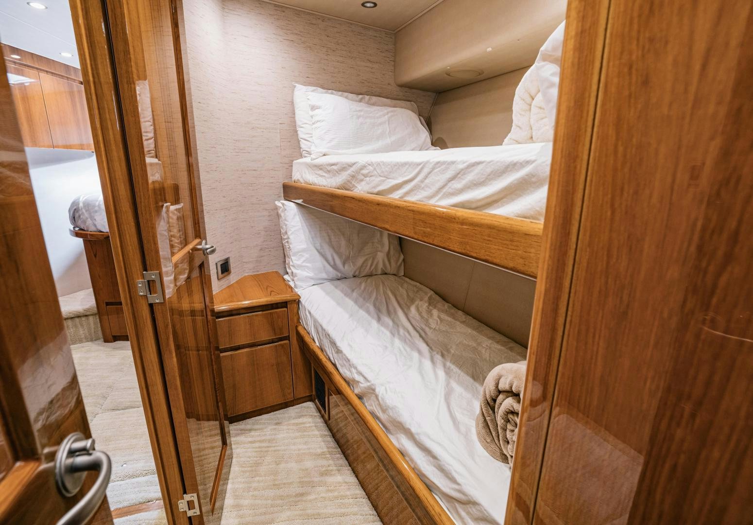 a bed in a room aboard SUNSHINE Yacht for Sale