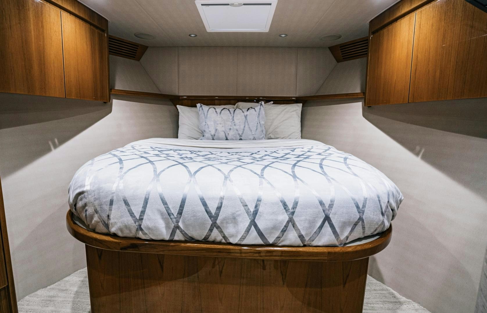 a bed in a room aboard SUNSHINE Yacht for Sale