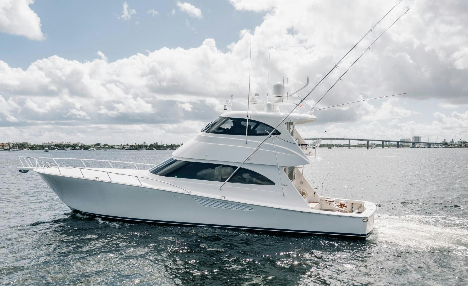 a white boat on the water aboard SUNSHINE Yacht for Sale