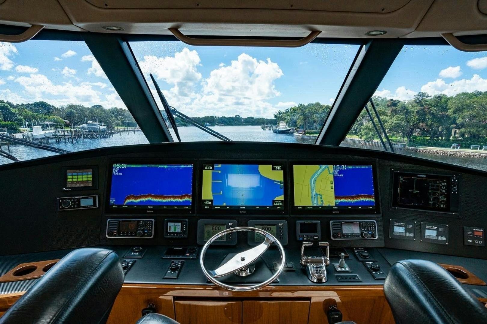 a car with multiple monitors aboard SUNSHINE Yacht for Sale