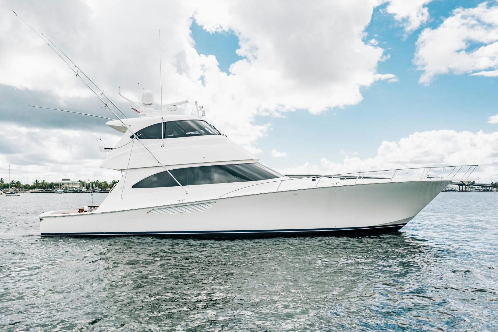 a white yacht on the water aboard SUNSHINE Yacht for Sale