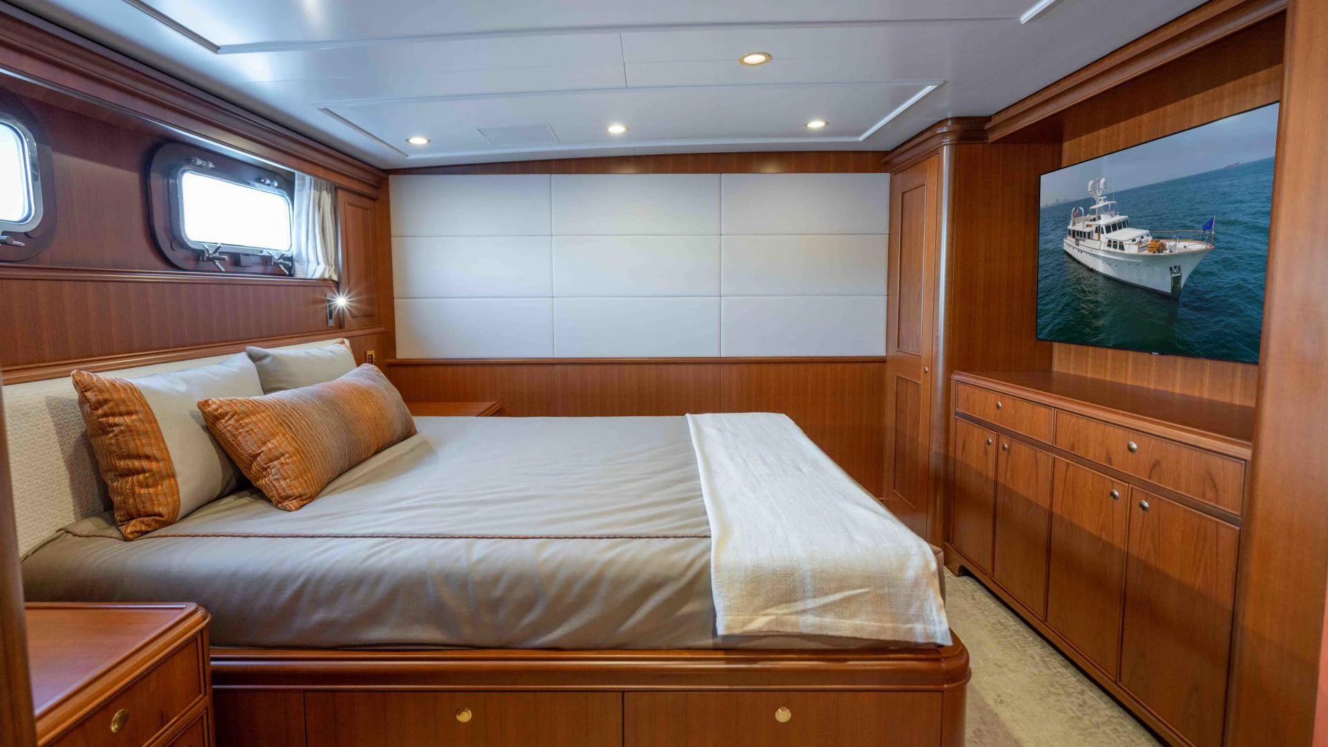 a bed in a room aboard NEREUS Yacht for Sale