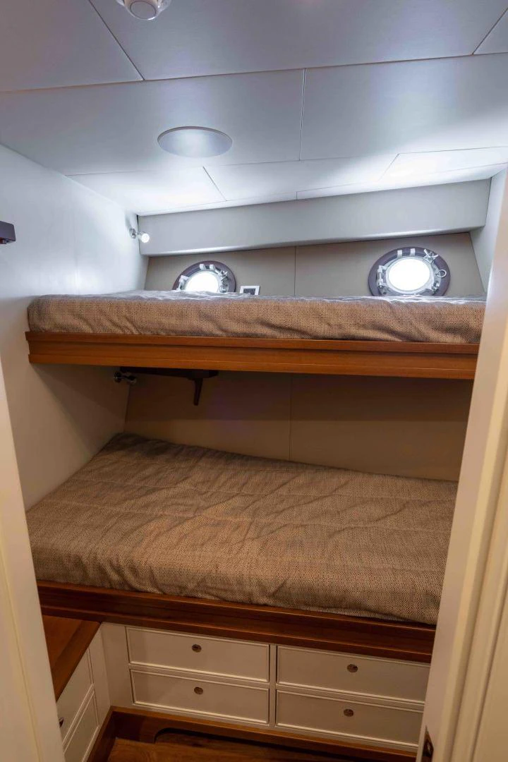 a white ceiling with a round light aboard NEREUS Yacht for Sale