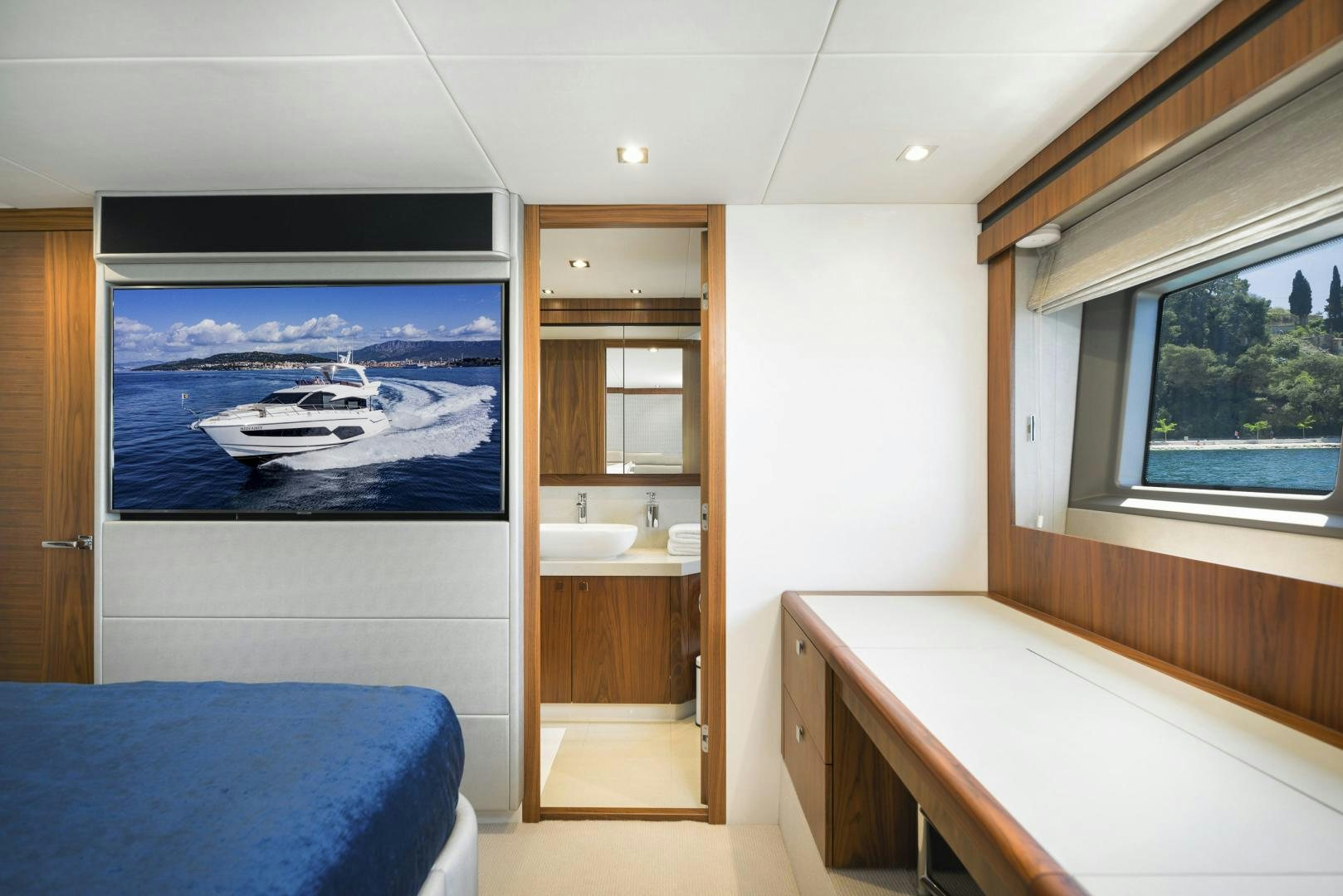 a room with a bed and a sink aboard HIDEAWAY Yacht for Sale