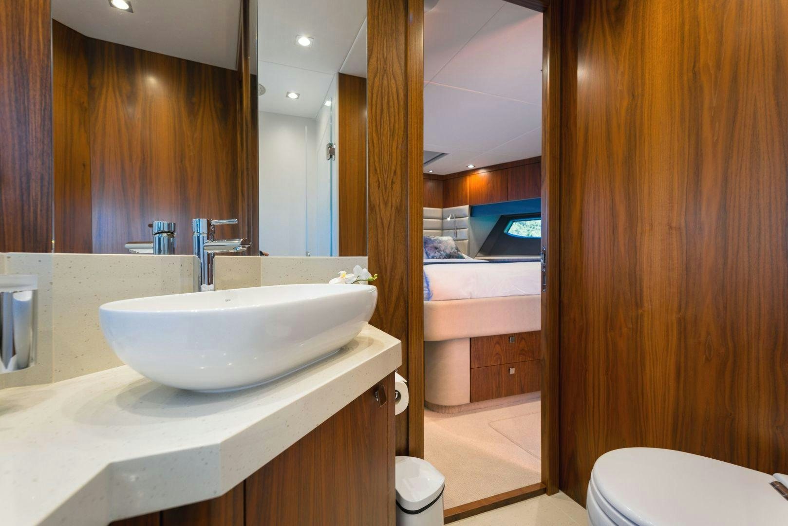 a bathroom with a sink and a bathtub aboard HIDEAWAY Yacht for Sale