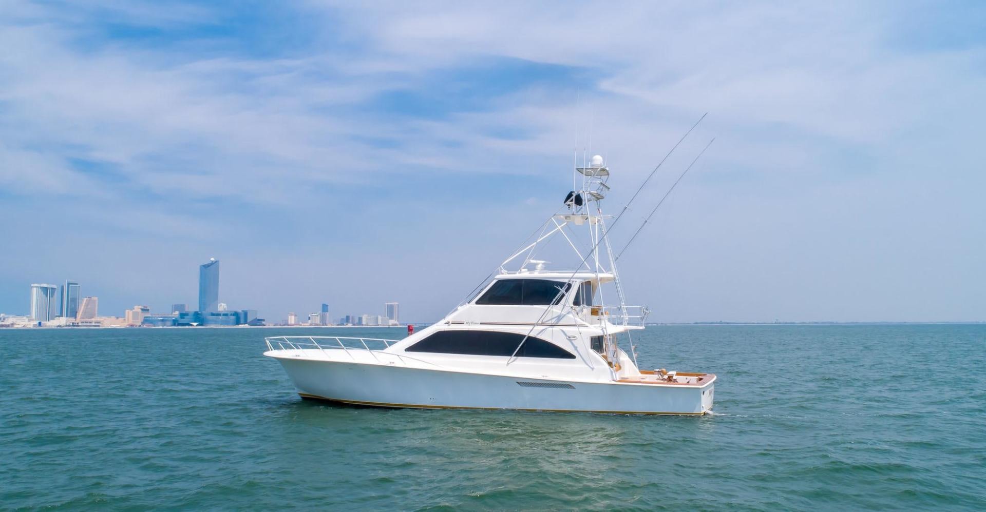 a white yacht in the water aboard My Time Yacht for Sale