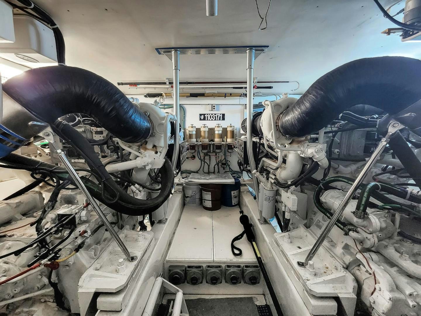 a car with a large engine aboard My Time Yacht for Sale