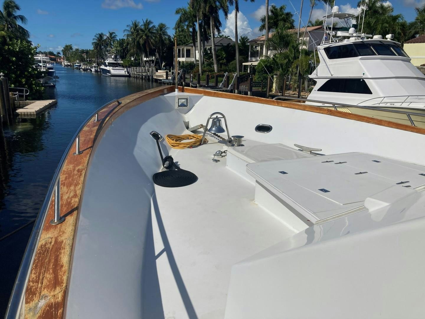 a boat parked on the side of a dock aboard GOLDEN RULE Yacht for Sale