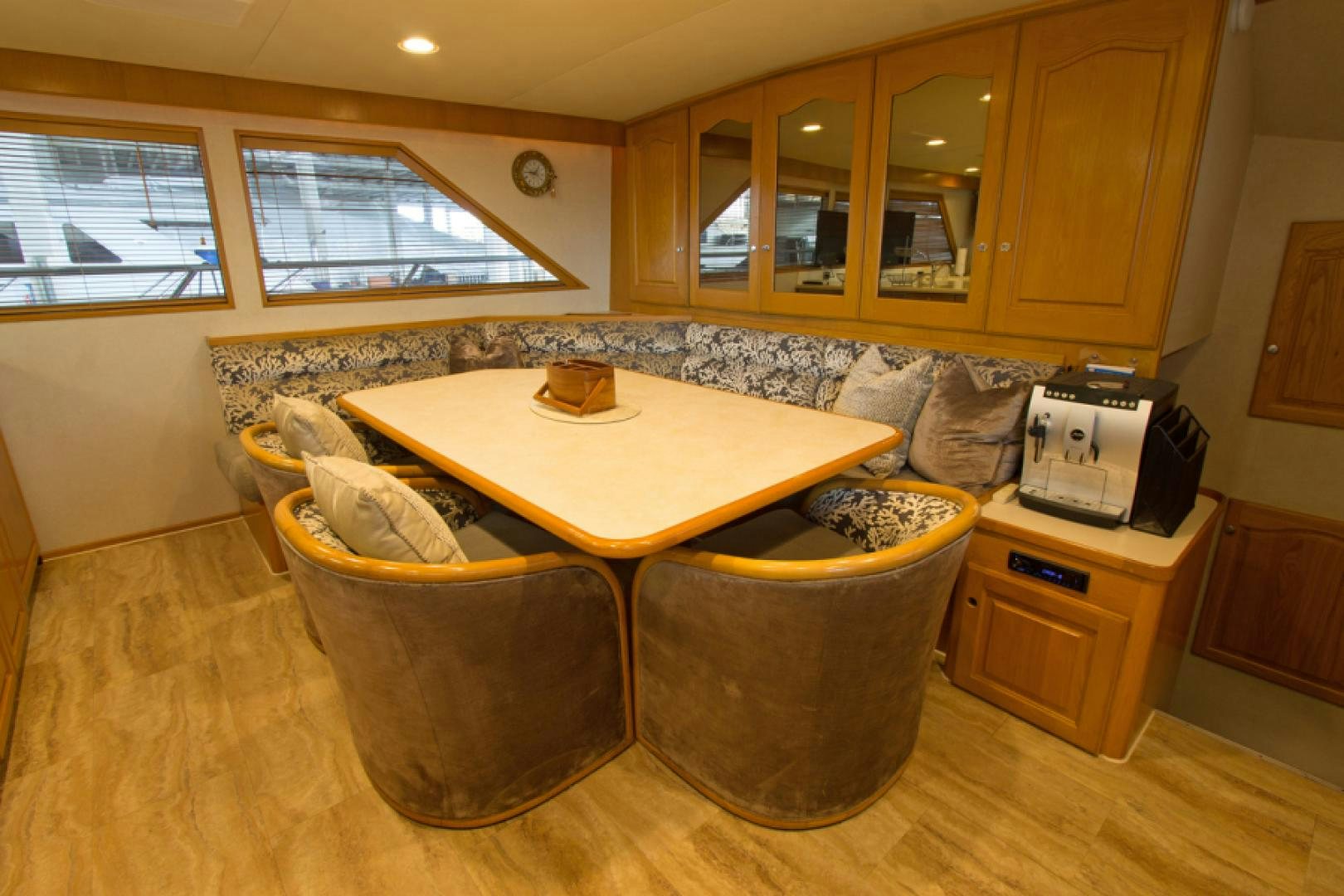 a kitchen with a couch and a table aboard GOLDEN RULE Yacht for Sale