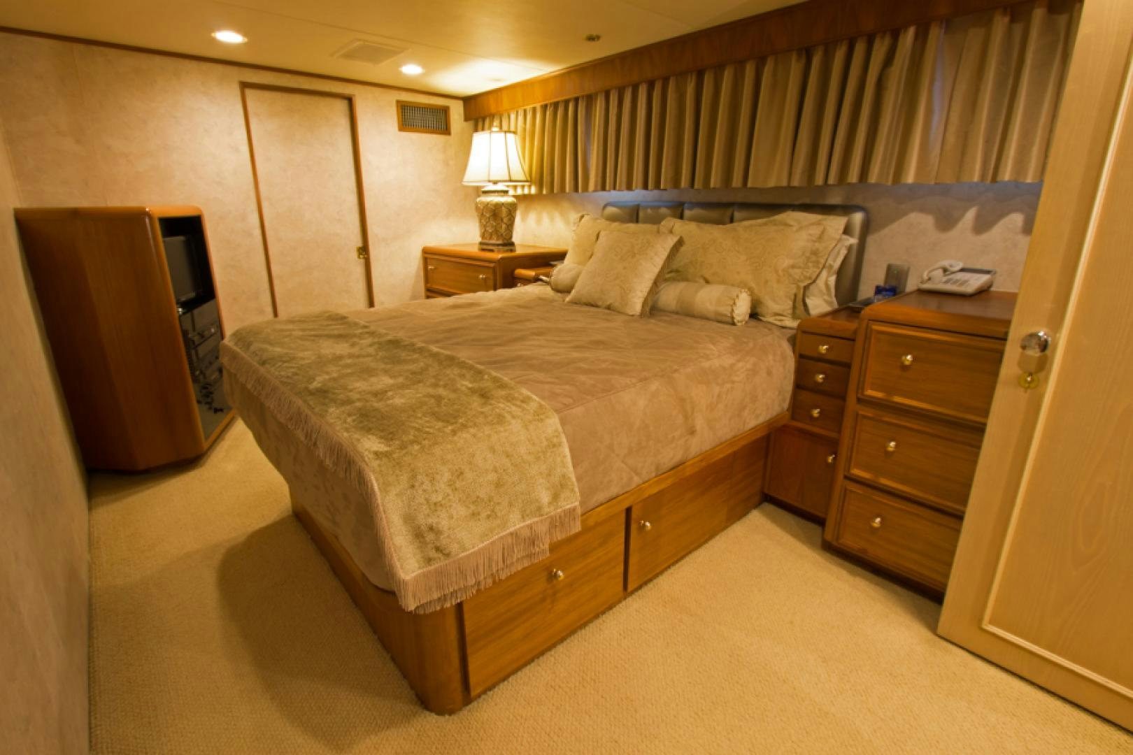 a bed in a hotel room aboard GOLDEN RULE Yacht for Sale