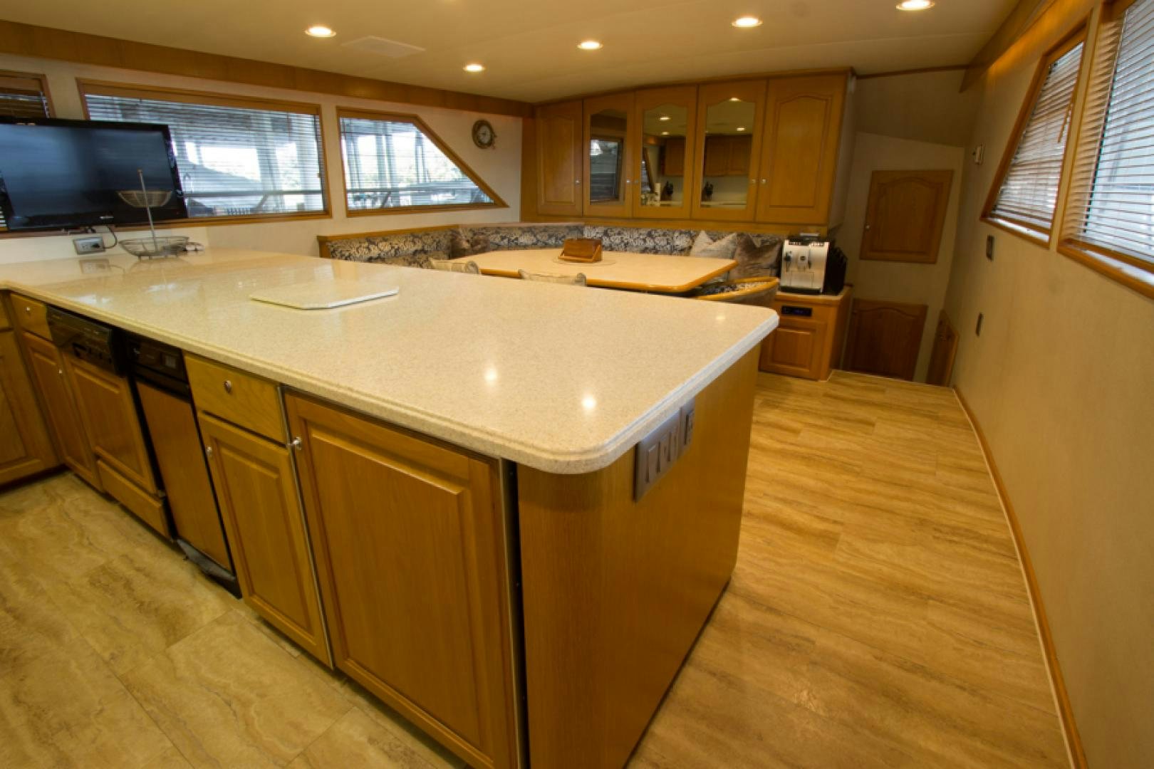 a kitchen with a large island aboard GOLDEN RULE Yacht for Sale
