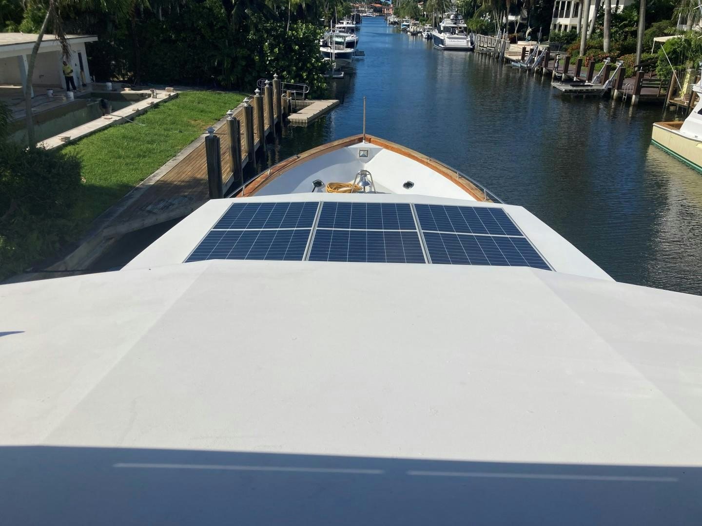 a swimming pool with a deck aboard GOLDEN RULE Yacht for Sale