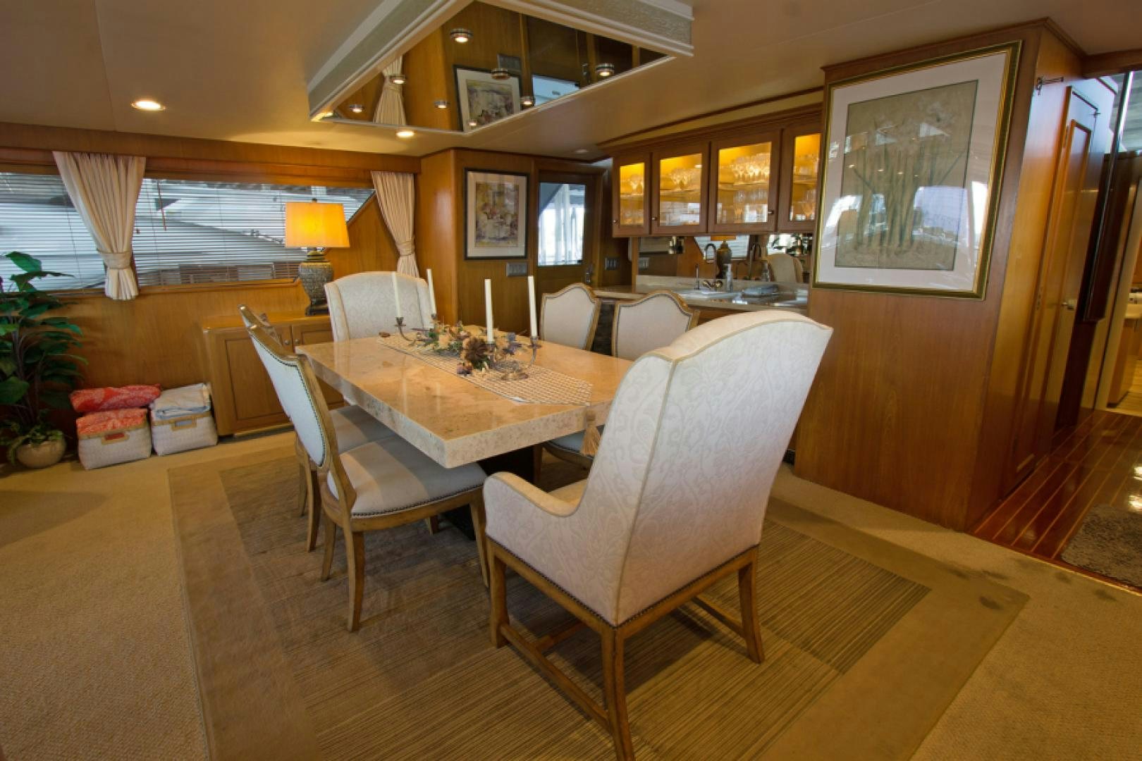a dining room with a table and chairs aboard GOLDEN RULE Yacht for Sale
