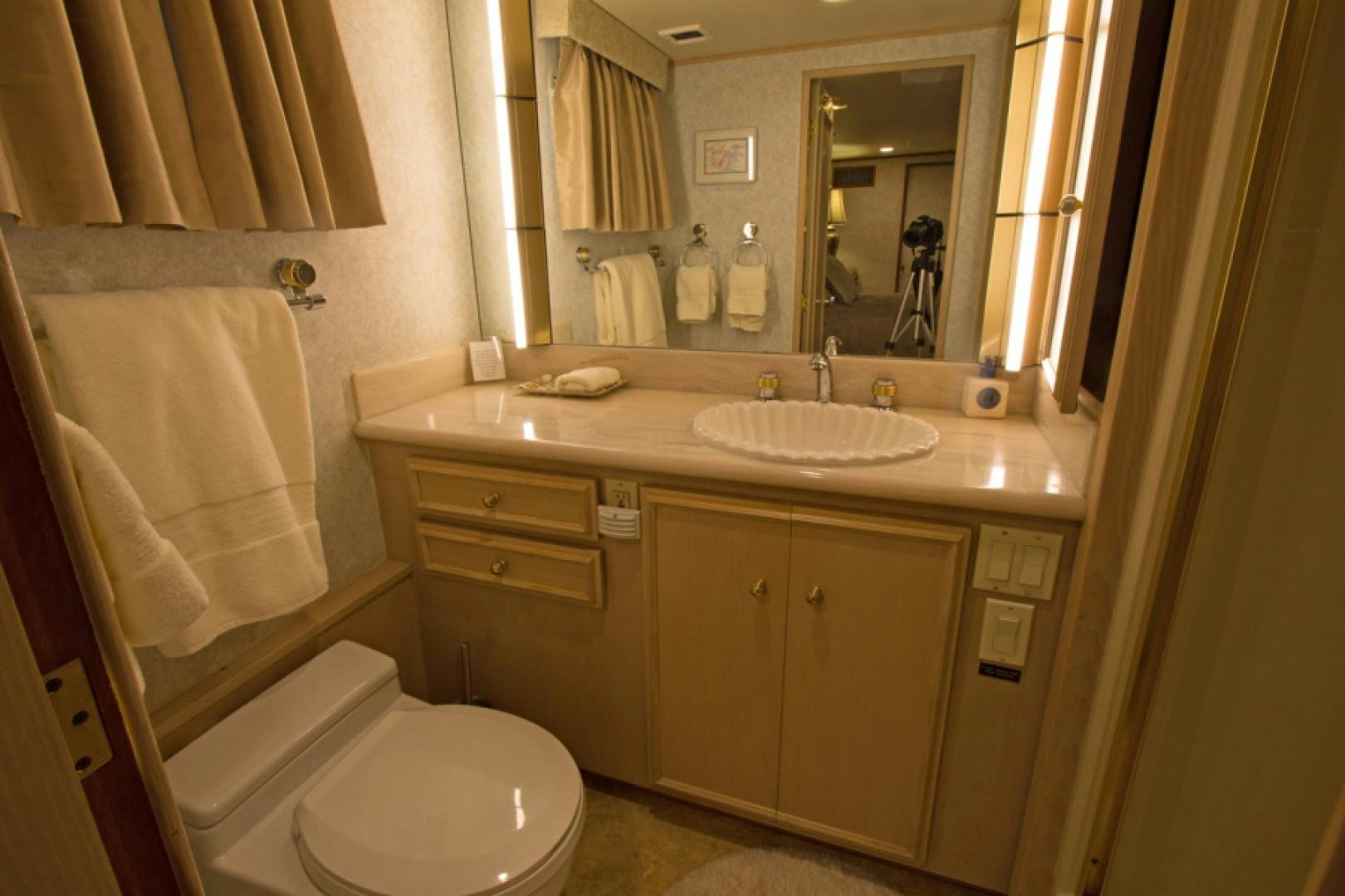 a bathroom with a large mirror aboard GOLDEN RULE Yacht for Sale