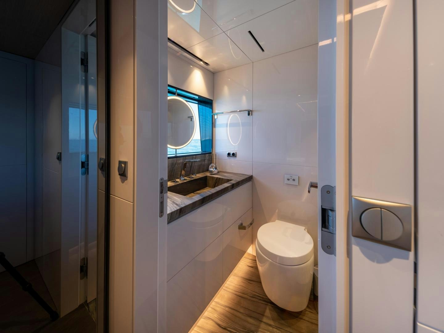 a bathroom with a toilet and a sink aboard EDGE   NB 201 Yacht for Sale