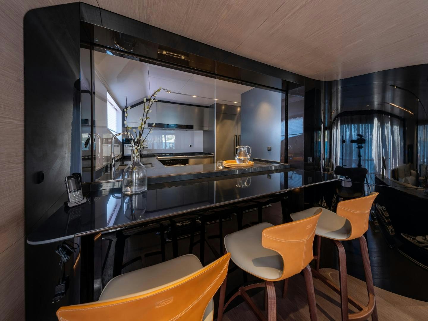 a kitchen with a glass wall aboard EDGE   NB 201 Yacht for Sale