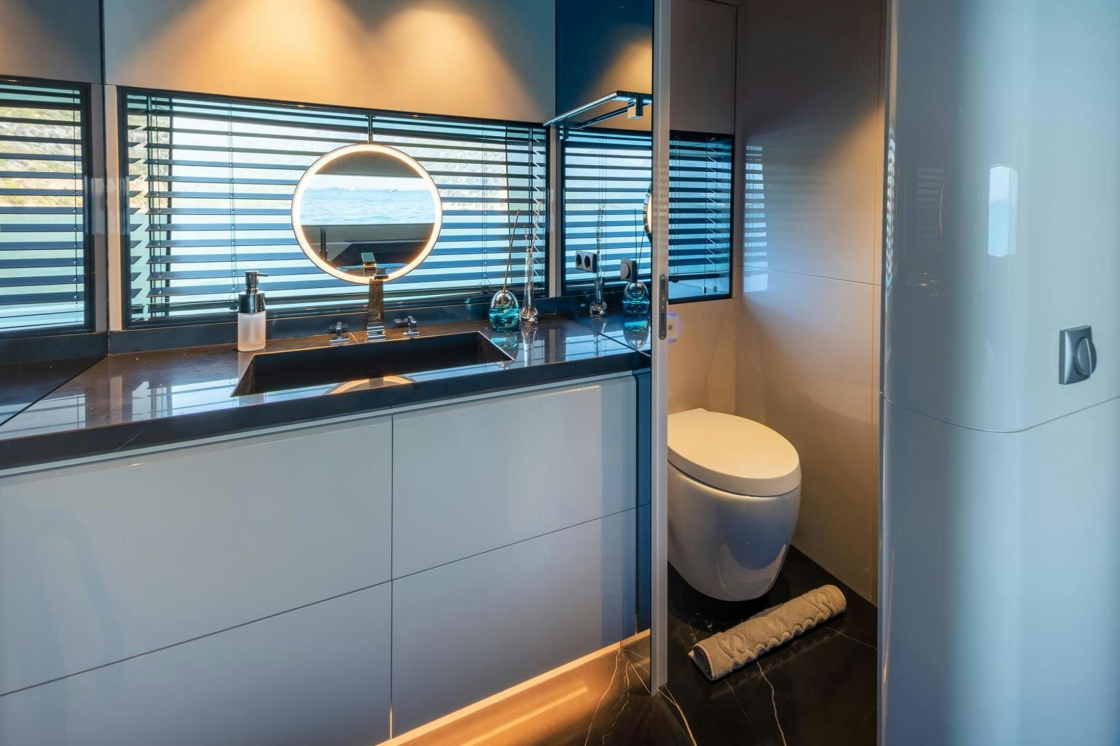 a bathroom with a sink and a toilet aboard EDGE   NB 201 Yacht for Sale