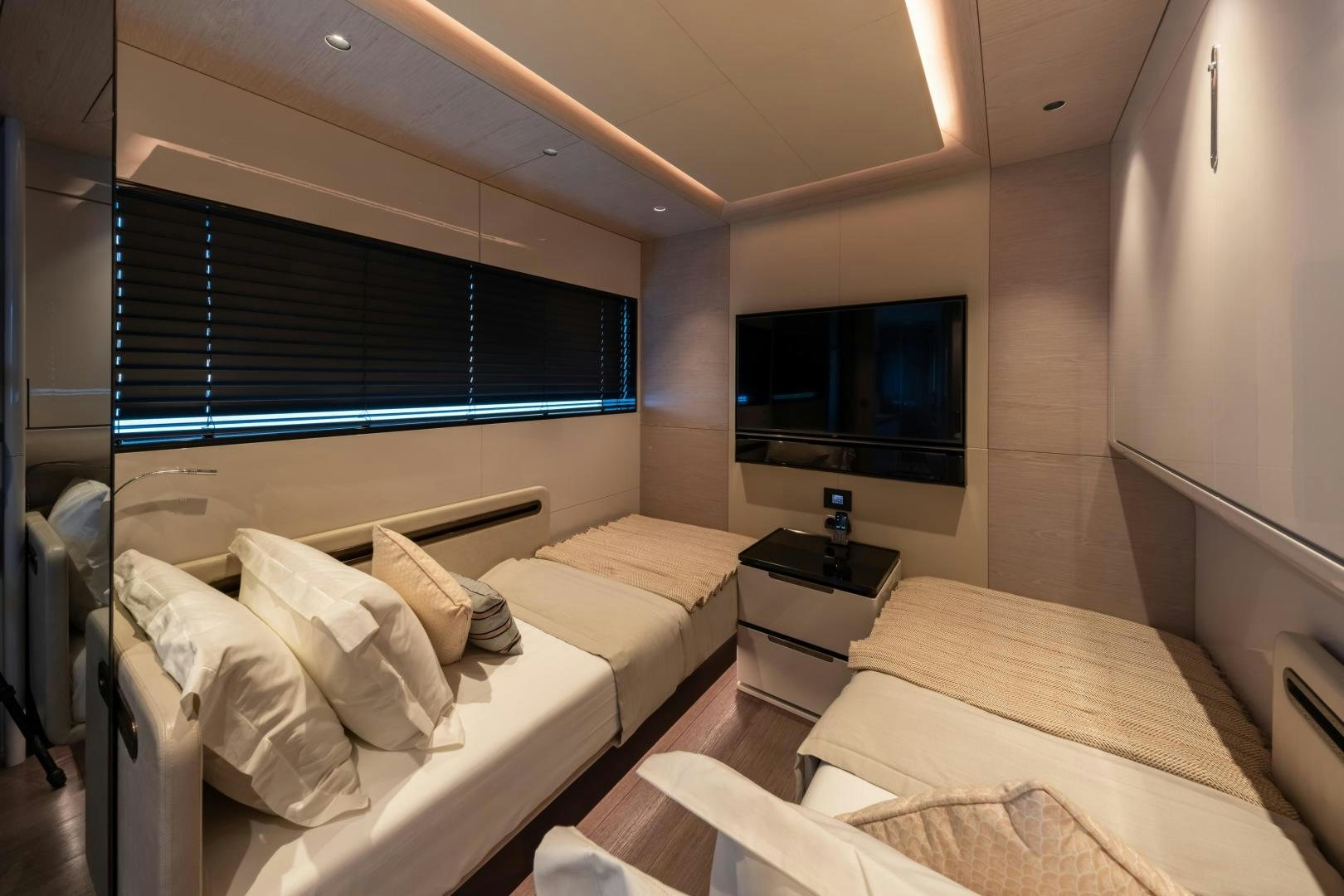 a room with a bed and a tv aboard EDGE   NB 201 Yacht for Sale