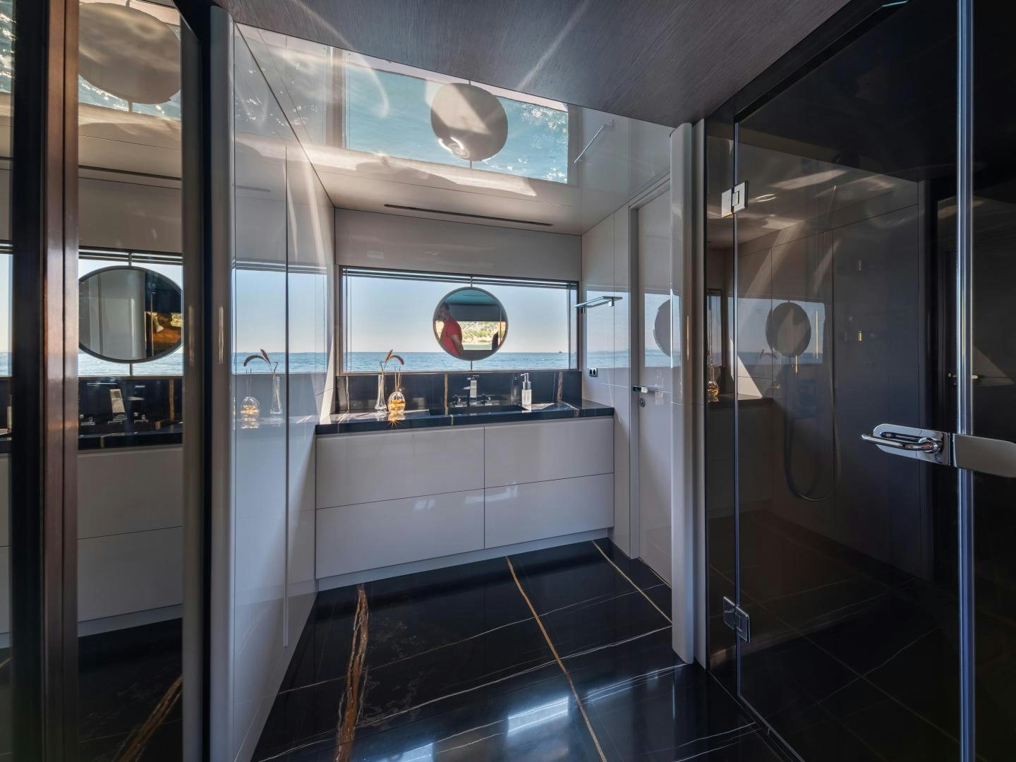 a bathroom with a glass shower aboard EDGE   NB 201 Yacht for Sale